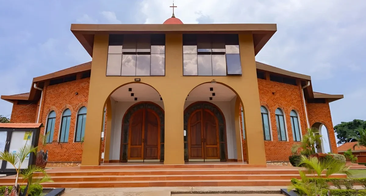 The St. Luke's C.O.U Ntinda church building, with twin arched entrances and a domed bell tower